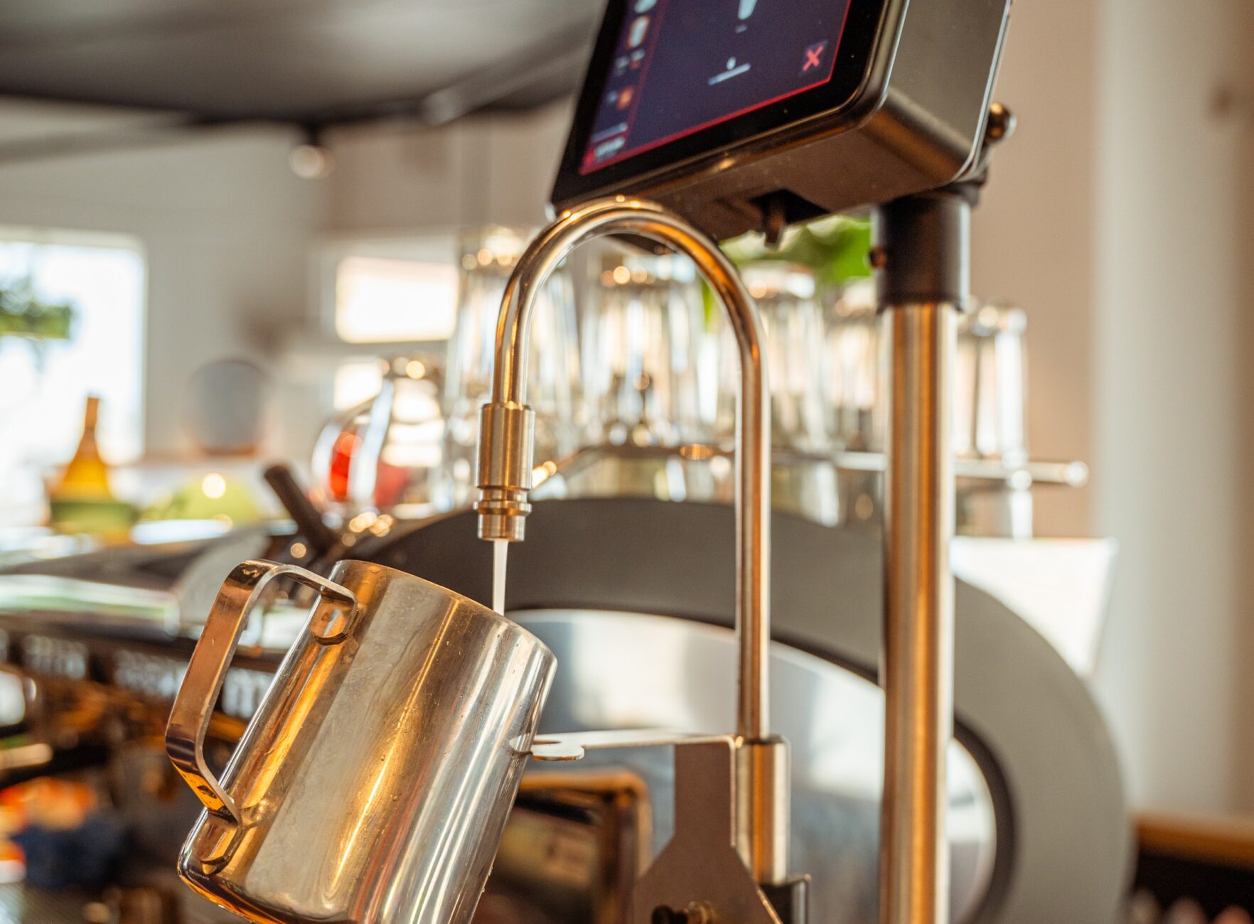 https://latteartfactory.com/wp-content/uploads/2026/07/Caffeine_Latte-Art-Factory_Barista_Automated-Milk-Frother-Machine_Milk-Waste-Reduction-in-Cafes.jpg